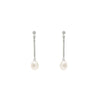 Long pearl earrings with movement and zirconia detail 