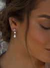 Petites boucles d'oreilles de mariée classiques en argent avec griffes