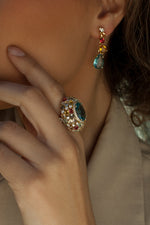 Ring with colored stones in bright tones