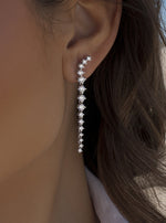 Long shiny silver bridal style dangle earrings