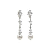 Long bridal earrings with zircons and finished with a pearl in floral motifs