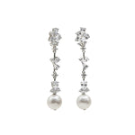 Long bridal earrings with zircons and finished with a pearl in floral motifs