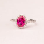 Oval ruby ​​zirconia ring with micro zirconia.