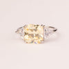 Square topaz ring with triangular zirconia