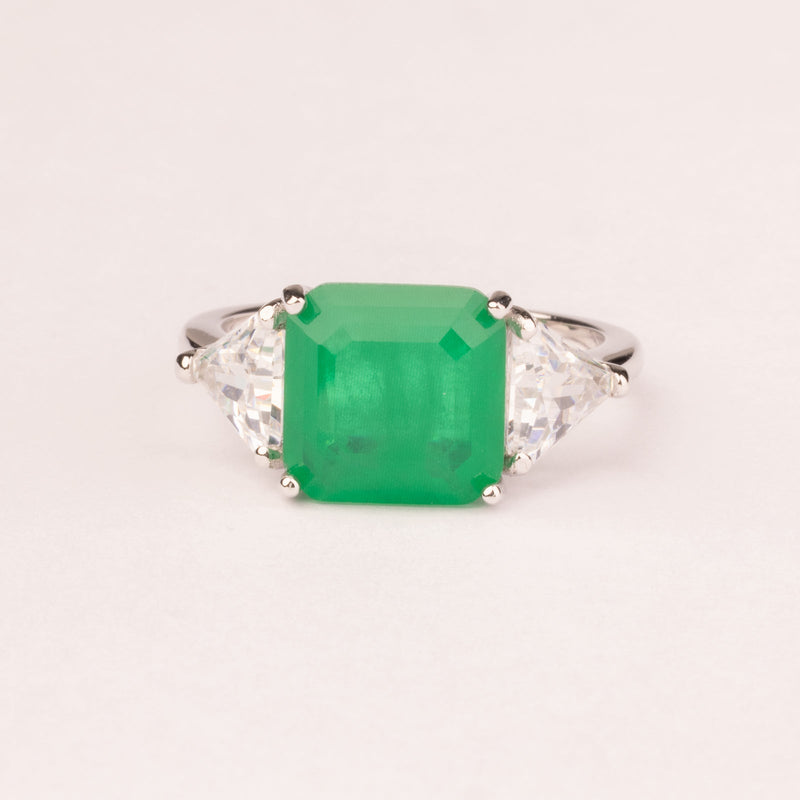 Square emerald ring with triangular zirconia