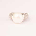 Stem ring with brilliant-cut zircons and shell pearls