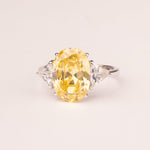 Ring with oval topaz zirconia