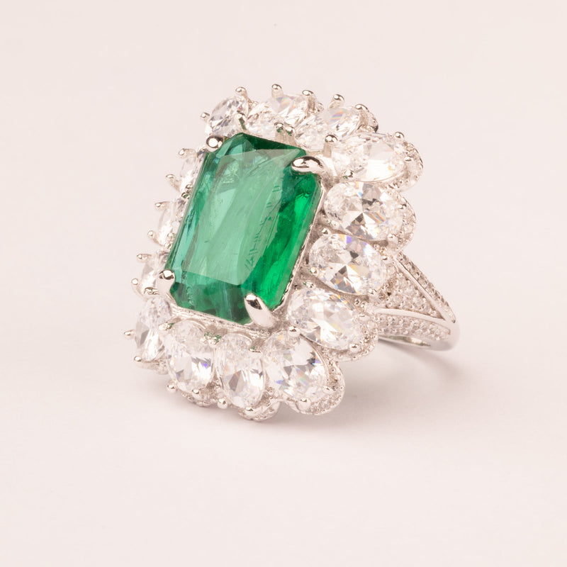 Emerald cut and pave emerald stone ring