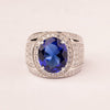 High central mesh ring with oval sapphire zirconia