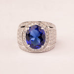 High central mesh ring with oval sapphire zirconia