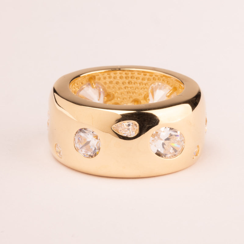 Band ring with multi-shaped white zircons plated in 18k gold