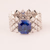 High and soft mesh with central emerald-cut sapphire zirconia