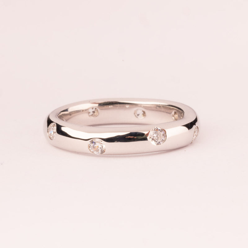 Plain ring with white zircons