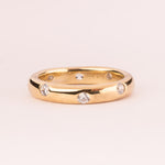 Plain ring with white zircons plated in 18k gold