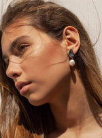 Boucles d'oreilles en perles suspendues au design liquide irrégulier