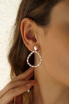 Pear-shaped pearl hoop earrings