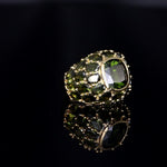 Thick cushion emerald ring