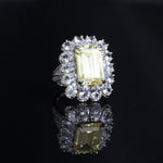 Emerald cut ruby ​​stone ring with pavé