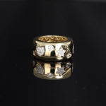 Band ring with multi-shaped pavé zircons plated in 18k gold