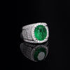 High central mesh ring with oval emerald zirconia