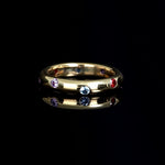 Plain ring with colored zircons