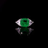 Square emerald ring with triangular zirconia