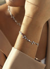 Thin silver bracelets with branch design and zircons 